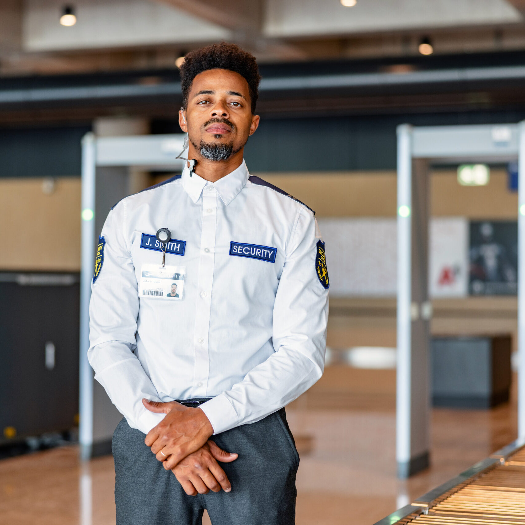 Guard monitoring airport security area