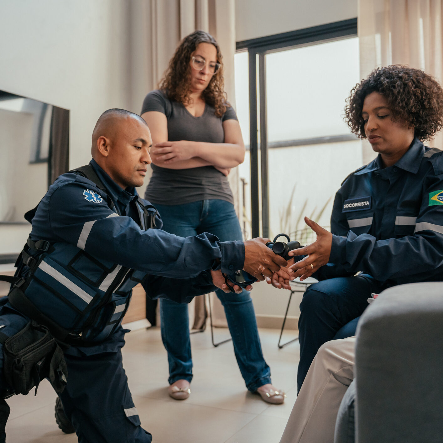 Officers in discussion with a resident.
